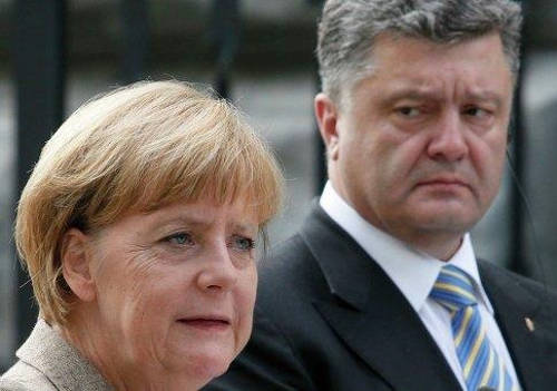 Порошенко поплакался в жилетку Меркель о несговорчивости МВФ