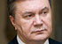 Янукович "ліпить калач" перед шахтарями.